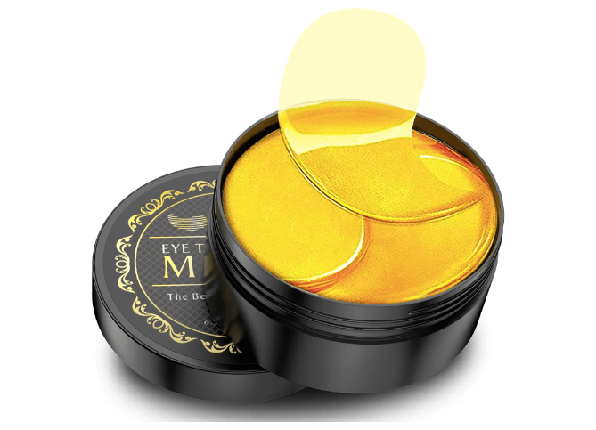 A container of 24K gold under eye patches with one patch partly removed, showcasing the product's vibrant yellow color and design.