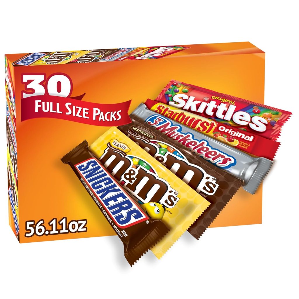 Variety pack of full-size candy including M&M'S, SNICKERS, 3 MUSKETEERS, SKITTLES, and STARBURST, featuring a bright orange box with '30 Full Size Packs' label.
