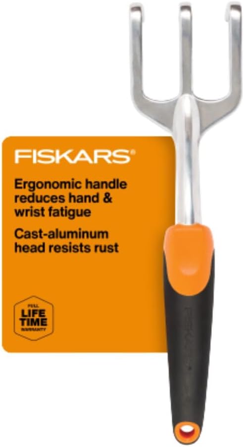 Fiskars Ergo Cultivator tool featuring an ergonomic handle designed to reduce hand and wrist fatigue, with a cast-aluminum head that resists rust.