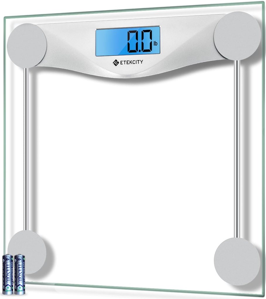 Etekcity digital body weight bathroom scale with a large blue LCD display, showing a weight of 0.0 lb, made of 6mm tempered glass, and features sleek silver accents.