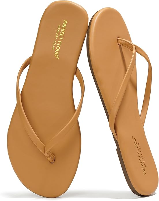 A pair of tan flip flops with a minimalist design, featuring a memory foam insole and 'Project Cloud' branding.