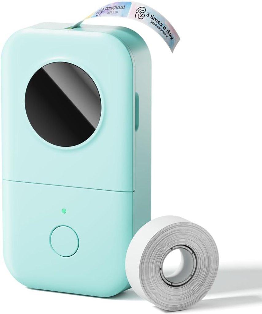 A mint green portable Bluetooth label maker with a round display on the front and a roll of thermal sticker tape beside it.