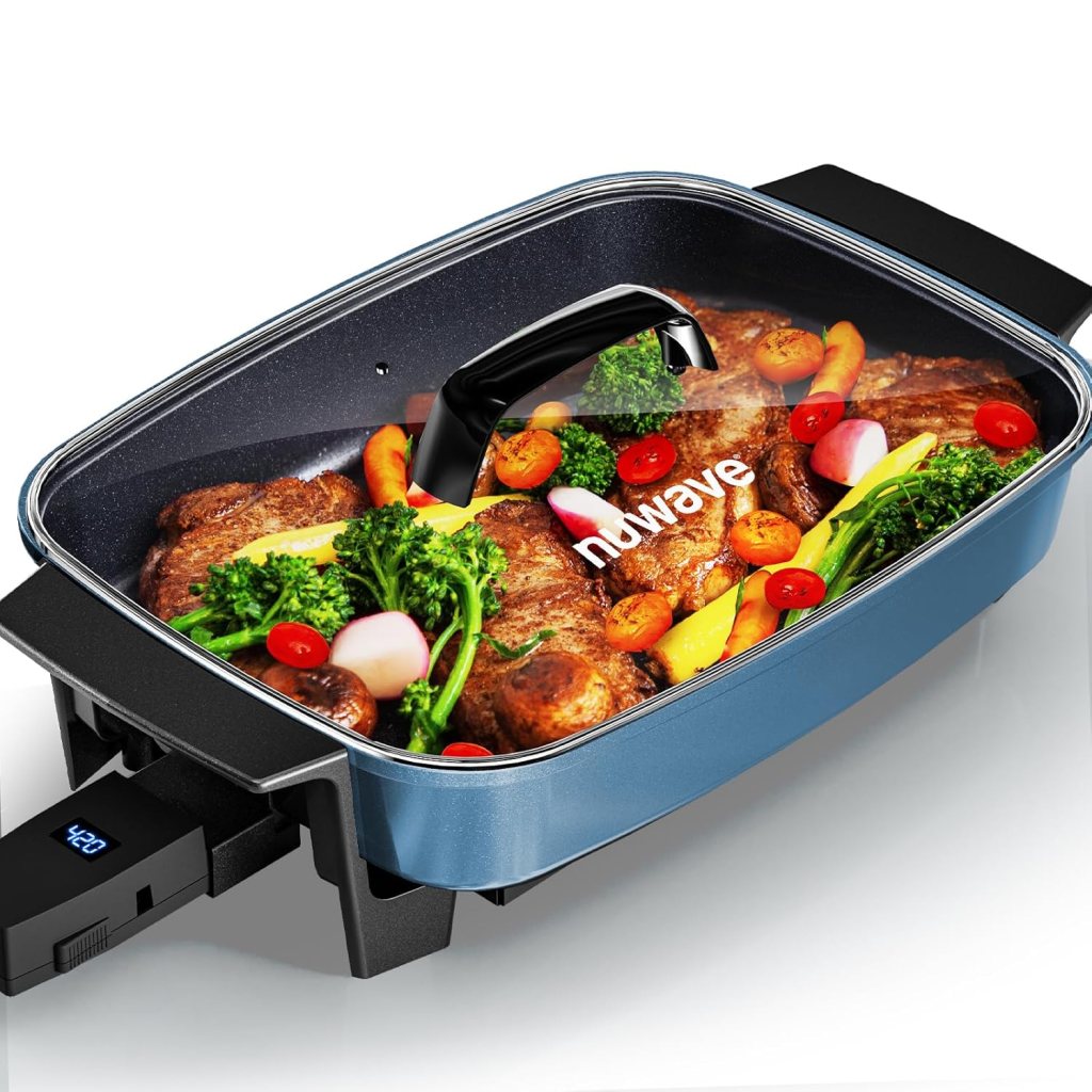 A Nuwave Medley XL Digital Electric Skillet featuring a glass lid, showcasing cooked meat and colorful vegetables inside. The skillet has a sleek design with a digital control panel.