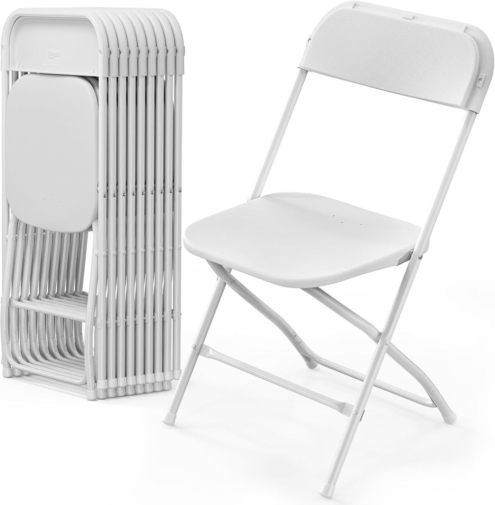 A stack of white plastic folding chairs next to an unfolded chair, showcasing their portable and stackable design.