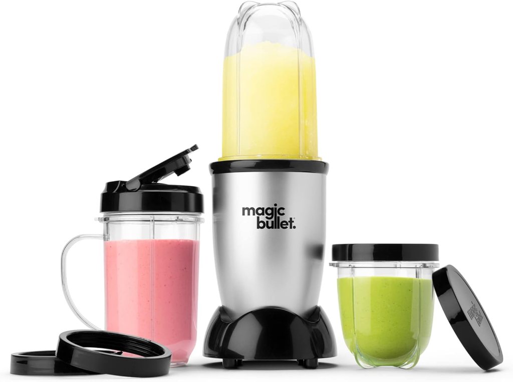 Magic Bullet Blender in silver with two containers; one pink smoothie and one green mixture.