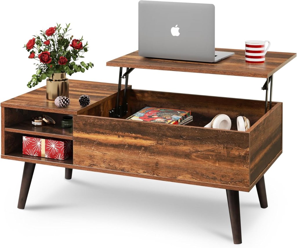 A rustic brown lift top coffee table featuring an adjustable shelf, storage compartment, decorative items like a vase of flowers, a laptop, and a striped mug.