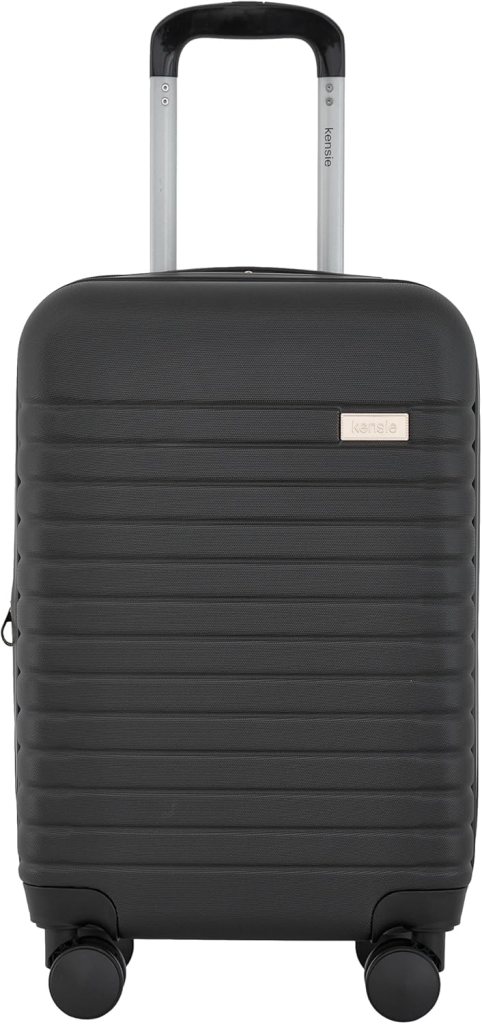 Front view of a kensie 20" Graceful Hardside Carry-On Luggage in black, featuring a textured surface and retractable handle.